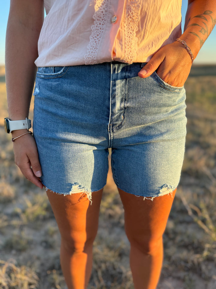 Medium Wash Mid Length Distressed Cut Off Shorts