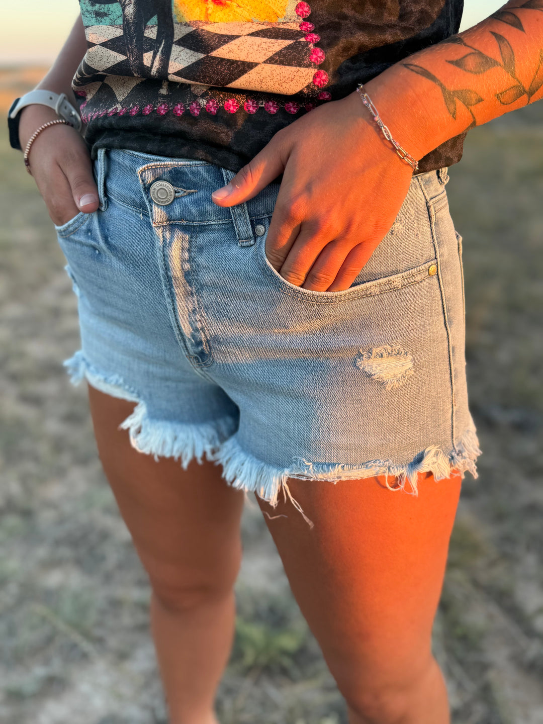 Light Wash High Rise Cut Off Distressed Denim Shorts