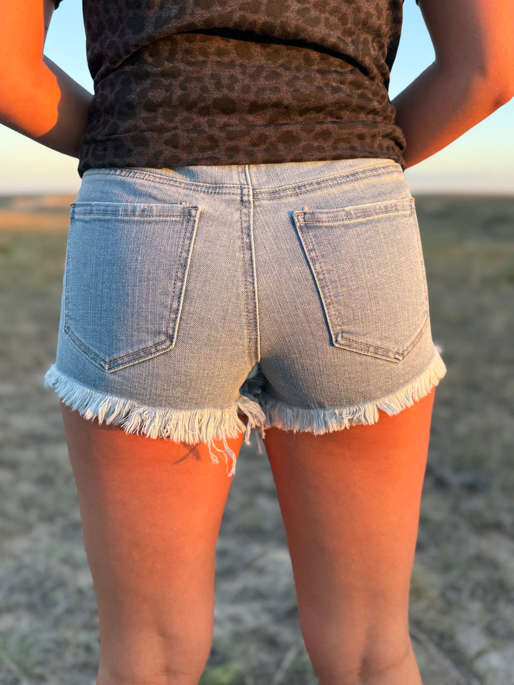 Light Wash High Rise Cut Off Distressed Denim Shorts