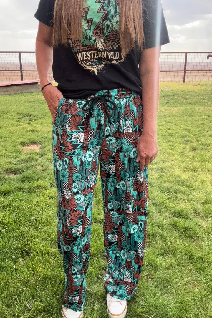 Sterling Kreek Tattoos In Turquoise Pants